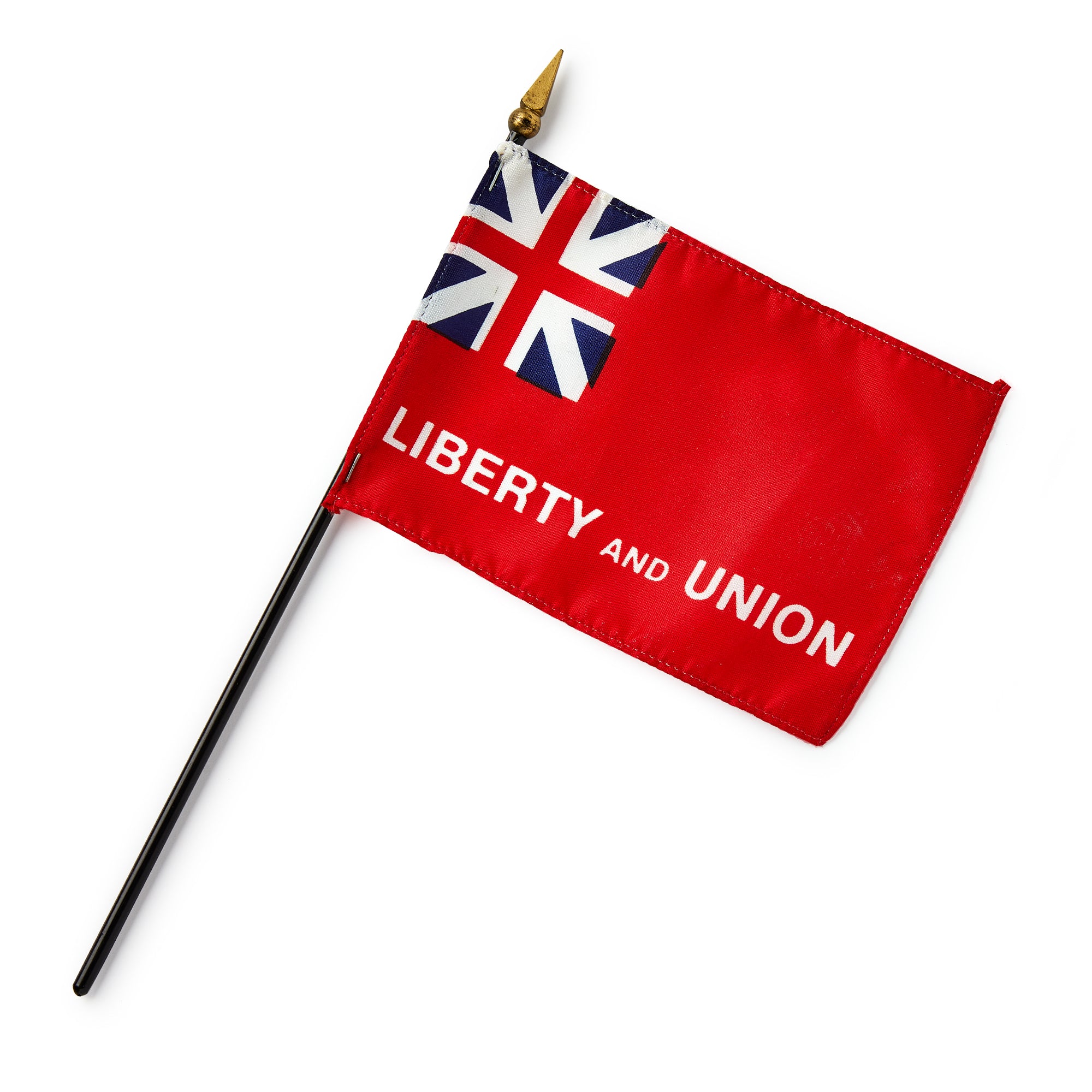 The Taunton Stick Flag, 4"x6", features a red background with the British Union Jack in the top left and “LIBERTY AND UNION” in white letters, attached to a black pole with a gold spear tip.
