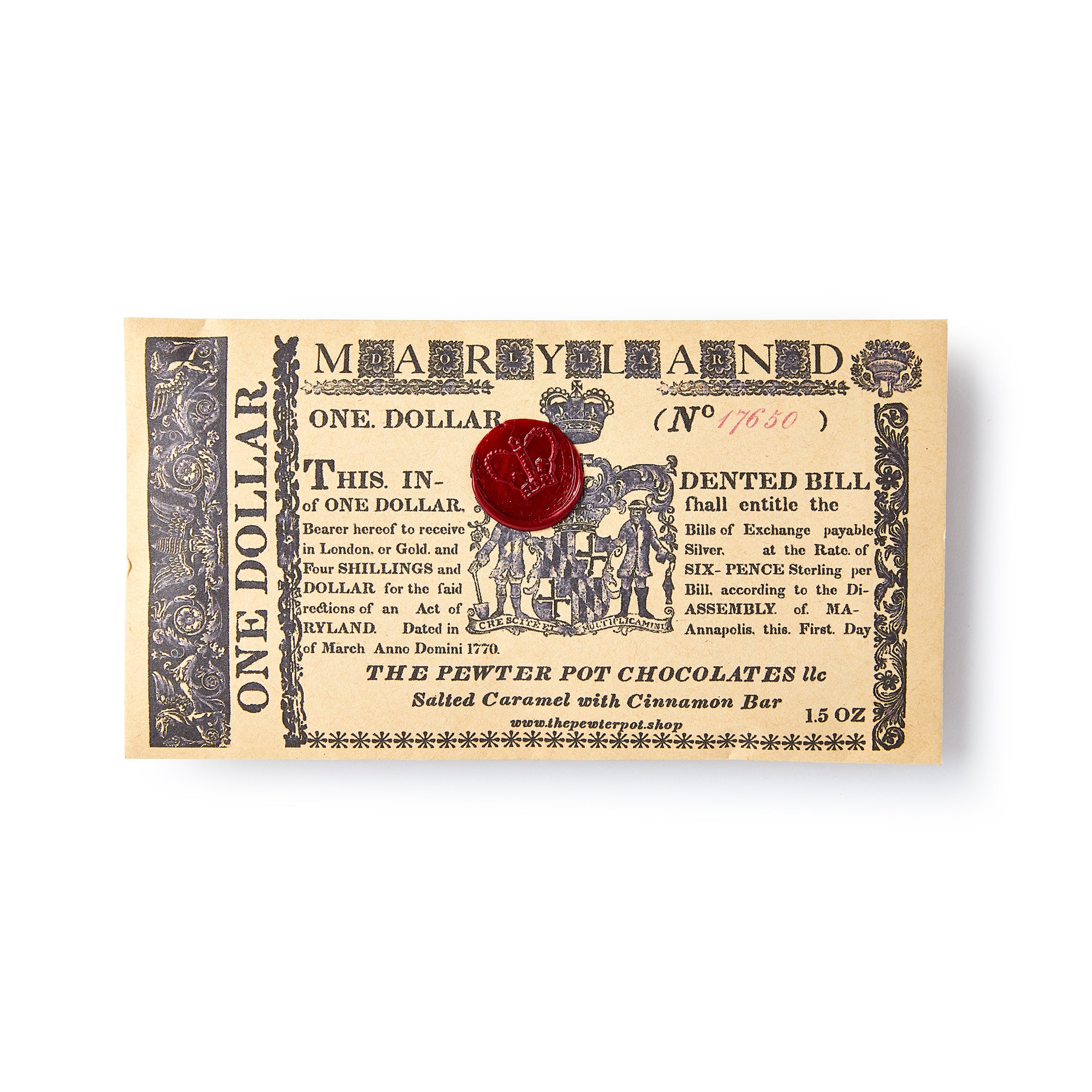 A vintage-style Maryland Chocolate Bar wrapper features ornate black text, designs, a red wax seal at the center, and "Salted Caramel with Cinnamon Bar" at the bottom.