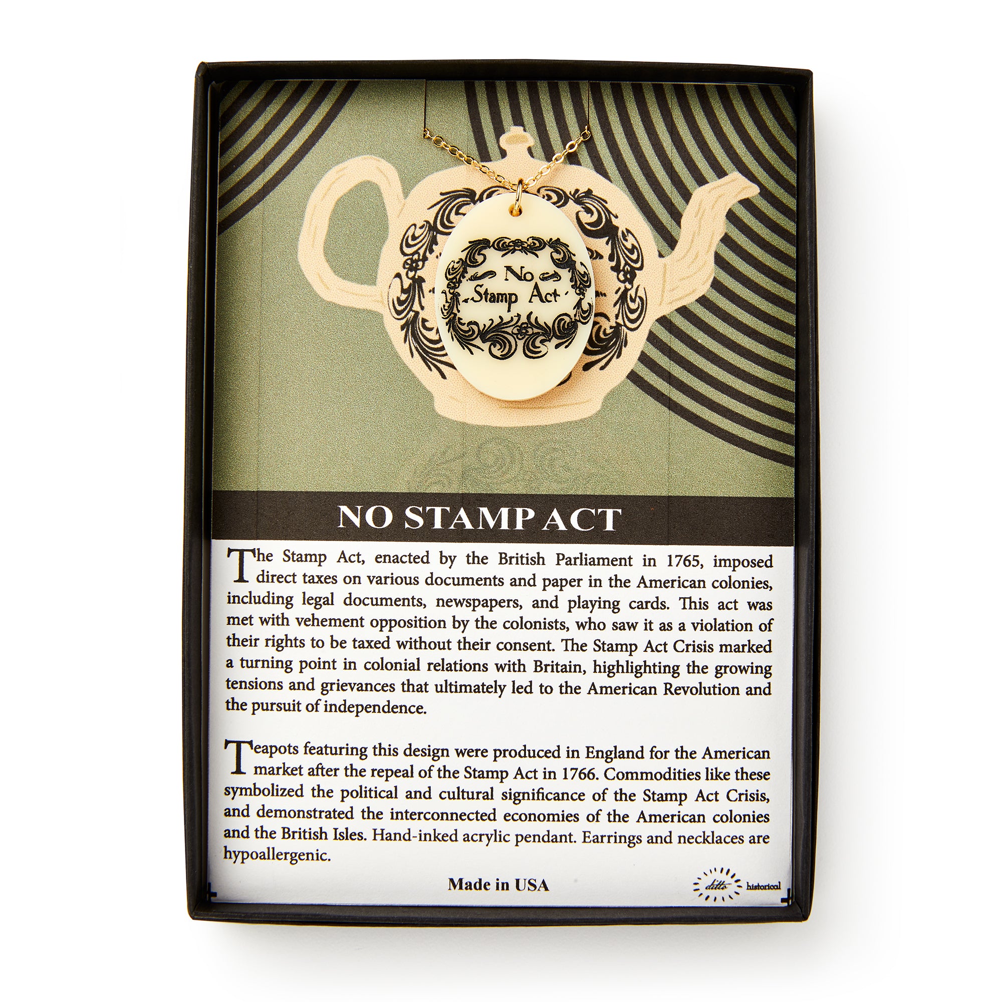 The No Stamp Act Necklace comes in a box with a teapot-shaped ornament and an info card about the 1765 British Stamp Act’s impact on colonists. Perfect for Revolutionary history fans, the box notes it’s made in the USA.