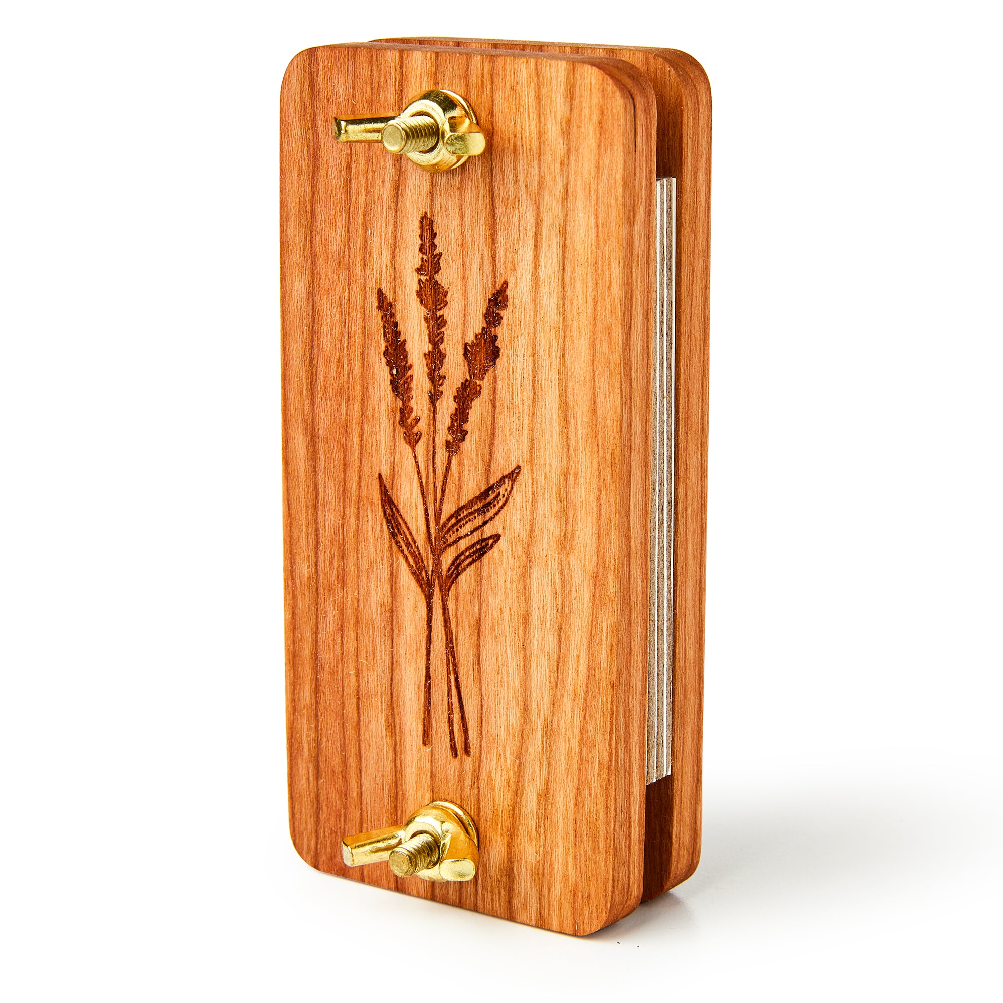 The Pocket Sized Flower Press is a handcrafted hardwood press with engraved wildflowers, featuring two brass screws and wingnuts for easy botanical preservation.