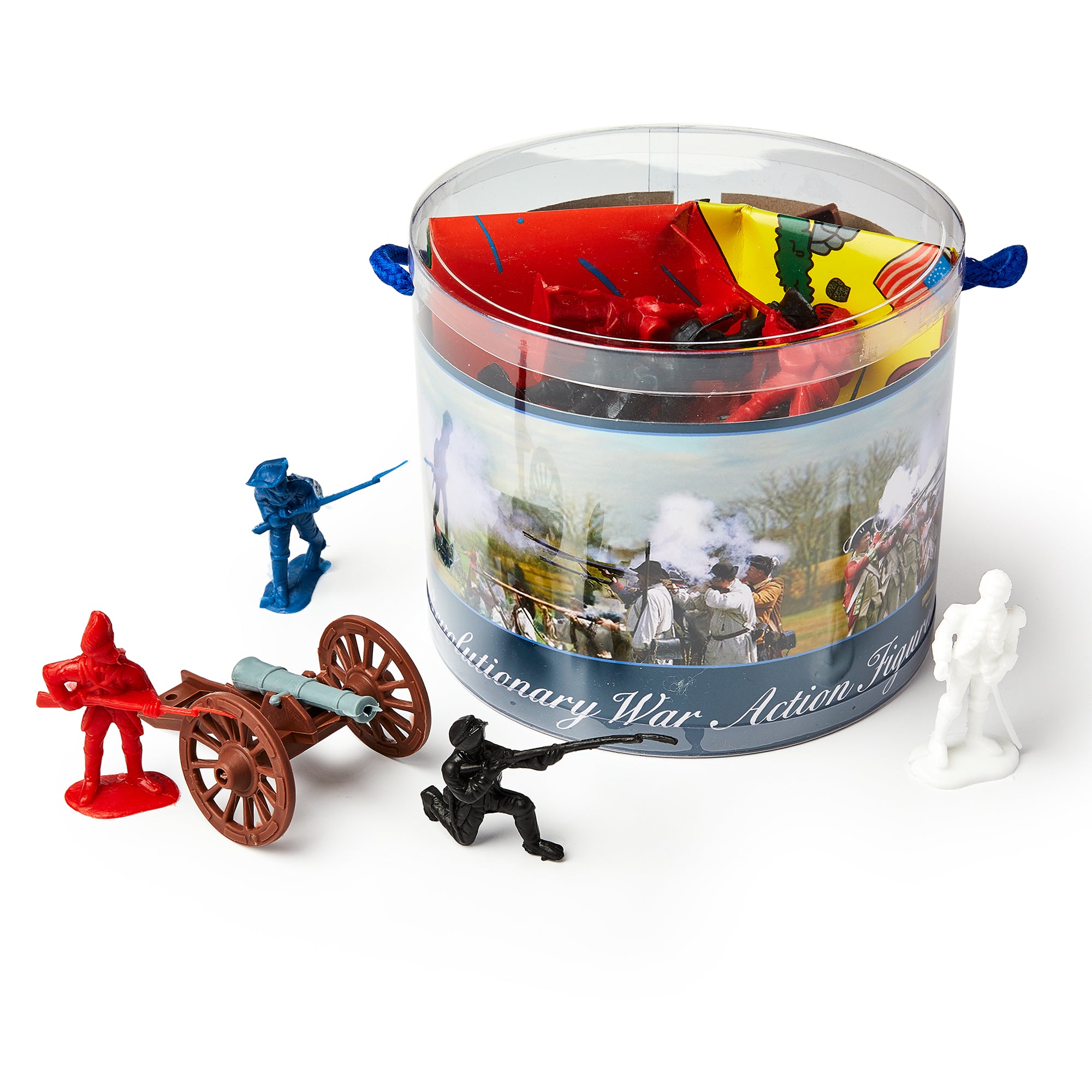 The Revolutionary War Soldier Bucket is a clear plastic container with blue handles, filled with red, blue, black, and white soldier figurines, accessories, and a brown cannon. The label shows battle reenactment images.