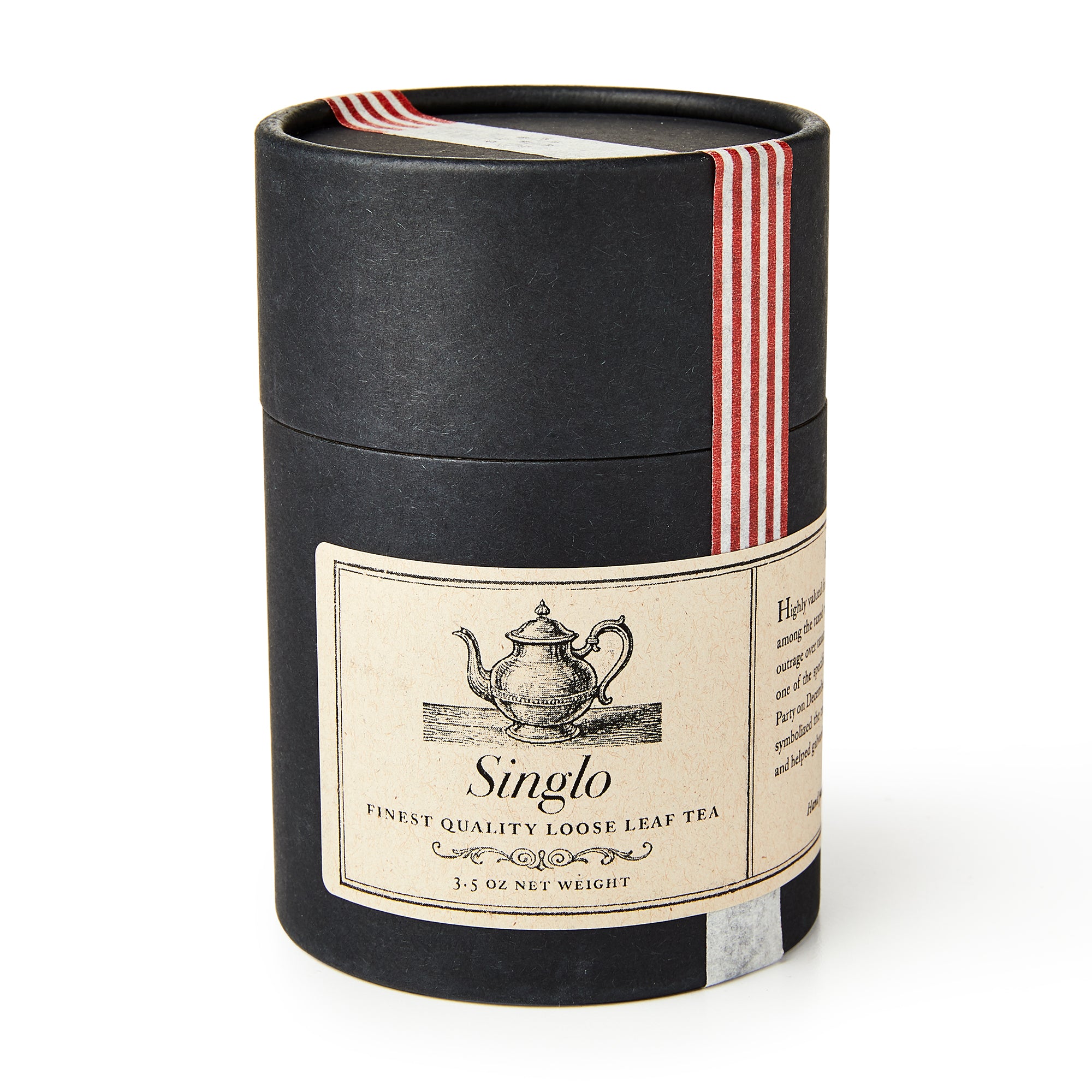 A black cylindrical canister labeled Singlo Loose Leaf Tea, featuring a red and white ribbon with a teapot illustration, holds 3.5 oz of green tea inspired by colonial American traditions.