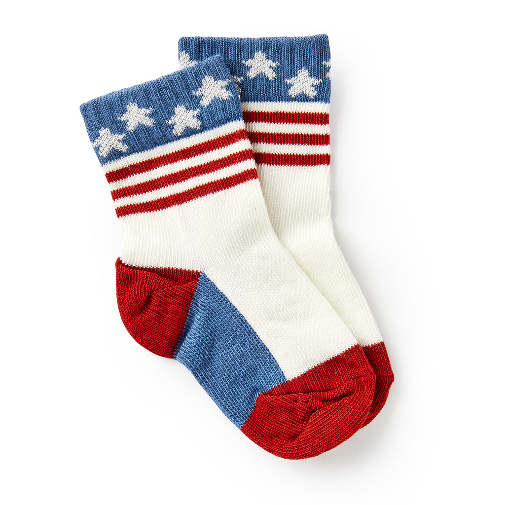 Stars and Stripes Socks, Baby/Toddler: A patriotic pair featuring blue cuffs with white stars, red and white stripes, white midsoles, and red toes and heels.