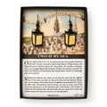 Two if by Sea Earrings: Lantern-shaped, hypoallergenic earrings in a gift box, showcasing historic Boston artwork and telling the story of Paul Revere’s Revolutionary War ride. Perfect for history enthusiasts.