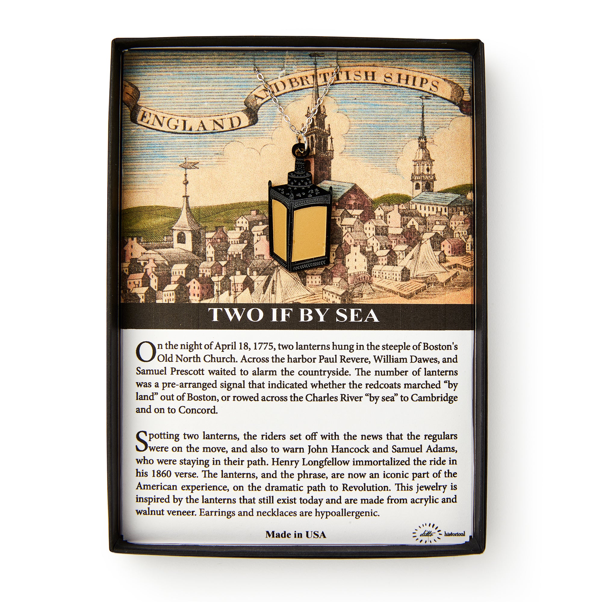 A decorative box holds the Two if by Sea Necklace, inspired by American Revolution jewelry, displayed over colonial Boston with ships and a church. Text explains the historic “Two if by Sea” lantern signal from the Revolution.