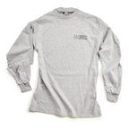The Chain of States Long Sleeve T-Shirt is light gray with the Museum of the American Revolution logo in black on the upper left chest. It features a crew neck and ribbed cuffs—perfect for history enthusiasts.