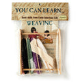 A Weaving Kit labeled "You Can Learn... Basic skills from Early American Life" includes yarn, a wooden frame, and instructions visible through clear plastic. The label shows two children honoring textile tradition.