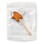 The Wooden Toy Star Wand by Bannor Toys is packaged in clear wrapping and displayed on a dotted white background labeled Modern Wood Toys.