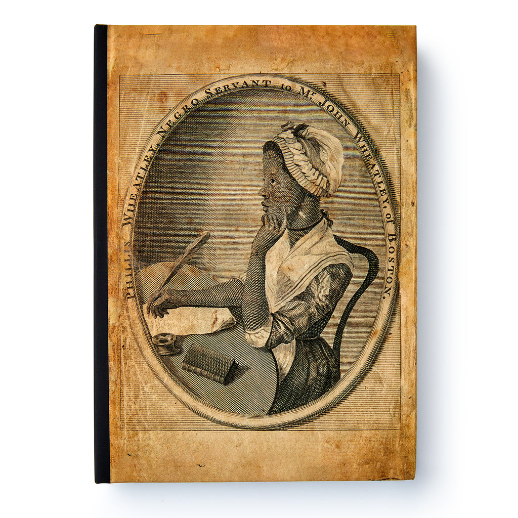 An old, sepia-toned illustration of an African American woman in 18th-century dress sits at a desk with quill and papers, framed in an oval—an homage featured on the Phillis Wheatley Large Journal celebrating her literary legacy.