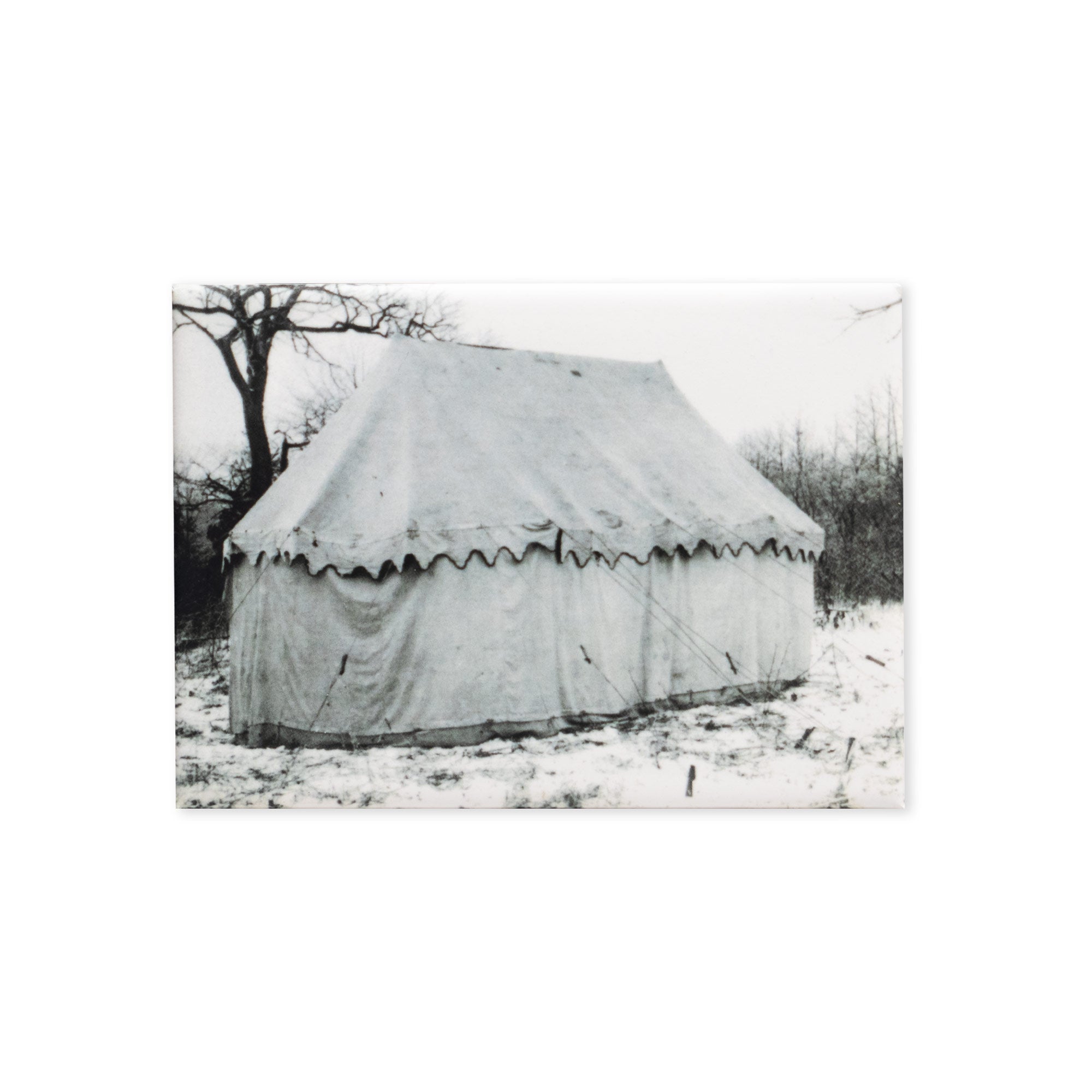 A black and white photo of George Washington's Tent in Snow Magnet showcases a large canvas tent set up outdoors in a snowy landscape, surrounded by leafless trees and sparse vegetation—an evocative image reminiscent of Revolutionary War history, perfect for collectors or as a unique souvenir.