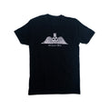 The Memento Mori T-Shirt is a black tee with a white graphic of a winged skull in a top hat, inspired by 18th-century gravestones, and MEMENTO MORI printed below the design.