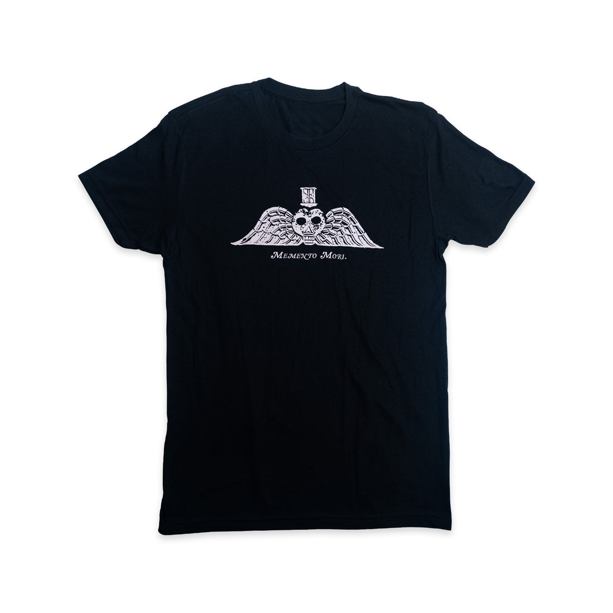 The Memento Mori T-Shirt is a black tee with a white graphic of a winged skull in a top hat, inspired by 18th-century gravestones, and MEMENTO MORI printed below the design.