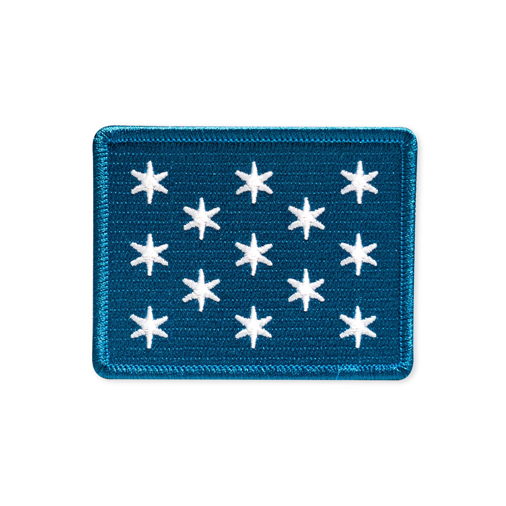 This rectangular blue iron-on patch features a border and thirteen white, six-pointed stars in rows. Its simple embroidered design resembles the historical George Washington Headquarters Flag Patch.