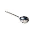 The Pewter Serving Ladle Spoon, featuring a shiny finish and a gently curved handle, is displayed on a white background and brings an elegant touch to any table setting.