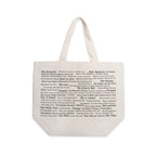 Introducing the Philadelphia Pride Ecotote—a cream-colored cotton canvas bag designed with two sturdy handles. It features bold black printed text in an array of font sizes and directions, listing iconic Philadelphia names, landmarks, and foods. Both stylish and functional, this tote is perfect for carrying your essentials or celebrating your Philly pride wherever you go.