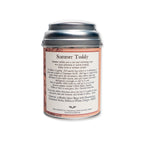 A silver tin labeled Summer Toddy, Spiced Hibiscus, complete with brewing instructions and a list of ingredients—highlighting an artisanal blend of cinnamon, hibiscus petals, ginger, and allspice—perfect for mixing into a refreshing toddy or cocktail. The tin is displayed against a plain white background.