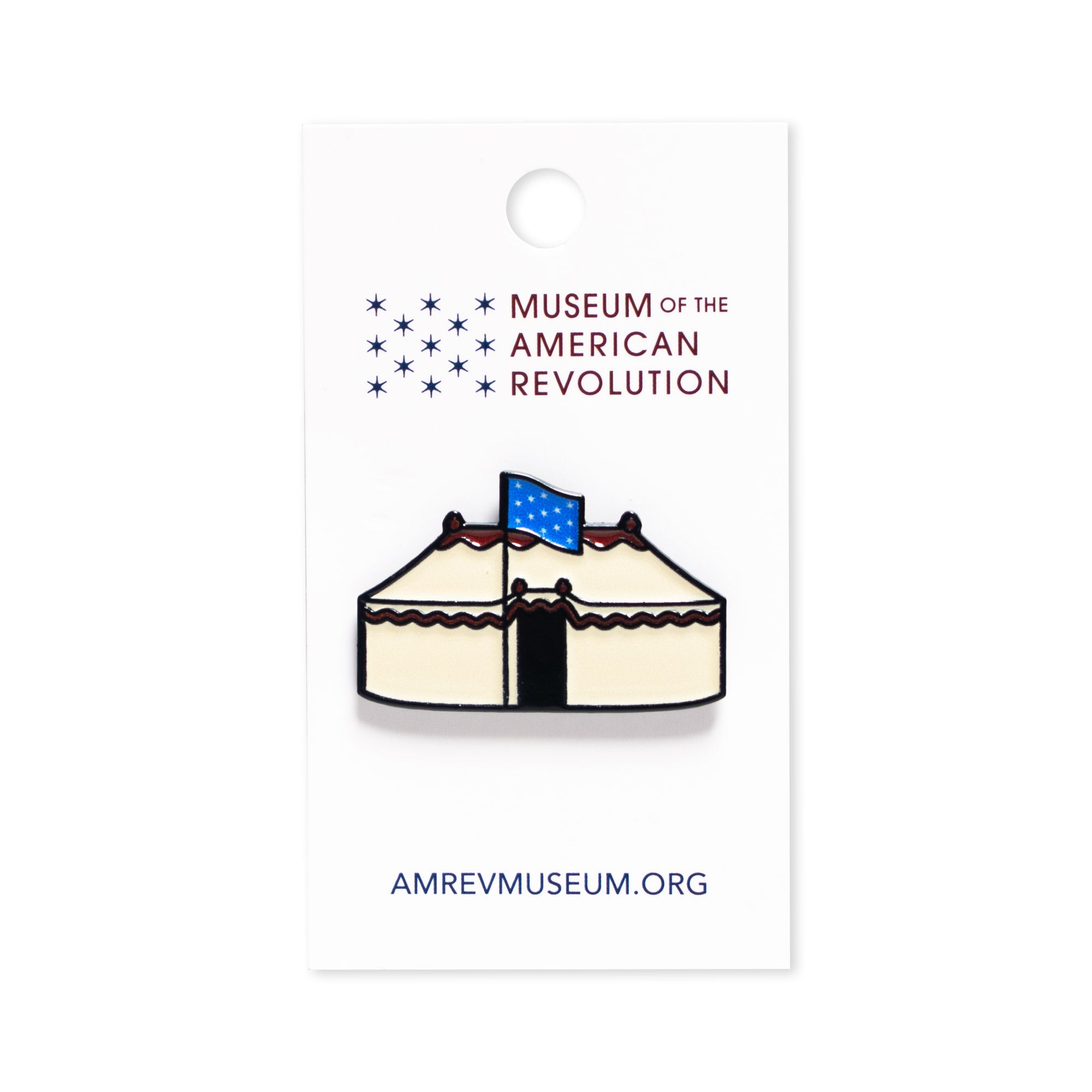 The George Washington Tent Pin: a cream-colored tent with a blue flag, displayed on carding with the Museum of the American Revolution’s logo and website—a unique historical keepsake.