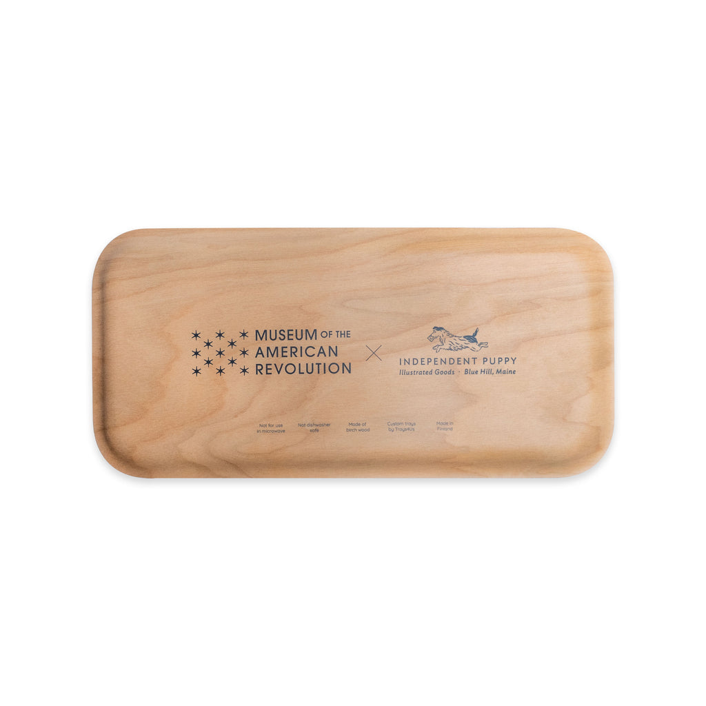 Rectangular birchwood Thomas Paine Quote Tray featuring the Museum of the American Revolution logo, a small dog illustration, and text detailing product care and origin.