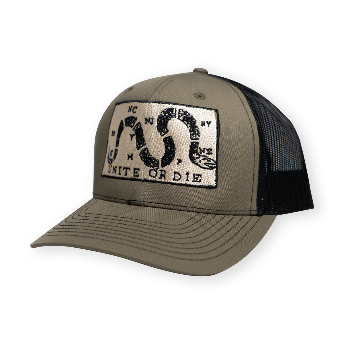 The Unite or Die Trucker Hat features a khaki and black design with a patch depicting a segmented snake and the phrase “UNITE OR DIE,” inspired by Benjamin Franklin’s iconic historical flag that pays tribute to American heritage.