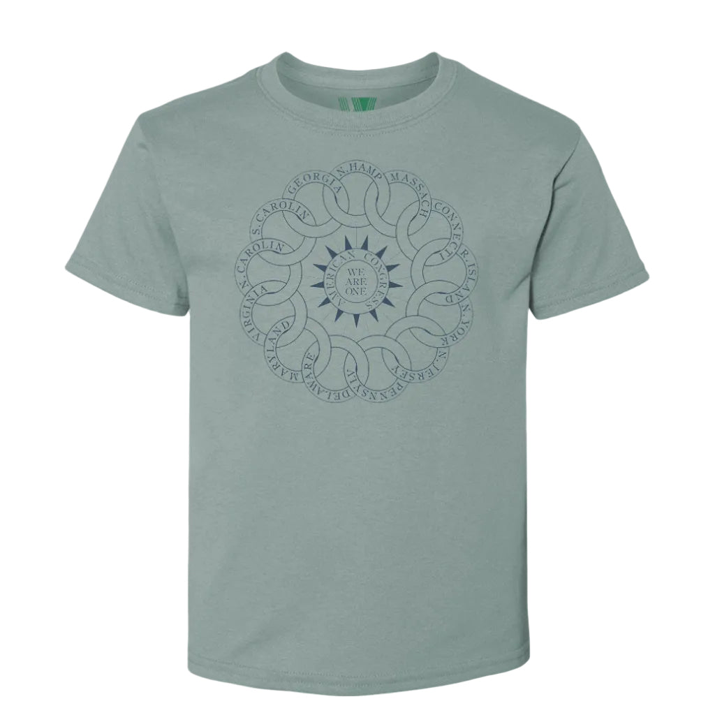 The Chain of States T-Shirt is a light green organic cotton tee with a dark blue circular, interwoven pattern and "WE ARE ONE" at the center, surrounded by state names forming a continuous ring, celebrating American unity.
