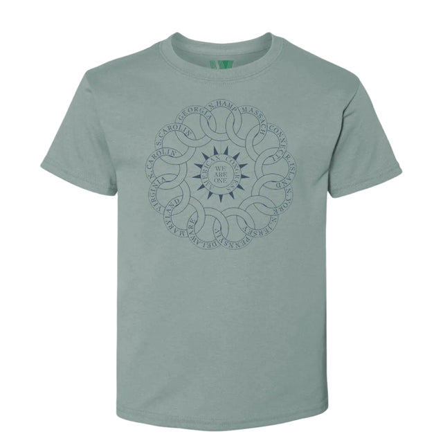 The Chain of States T-Shirt is a light green organic cotton tee with a dark blue circular, interwoven pattern and "WE ARE ONE" at the center, surrounded by state names forming a continuous ring, celebrating American unity.