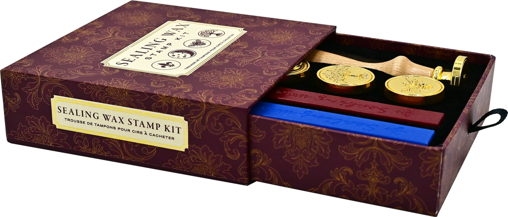 An open decorative maroon box labeled Sealing Wax Stamp Kit displays a brass stamp set with wooden handles and three sealing wax sticks in red and blue, perfect for making elegant wax seals.