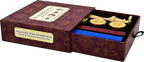 An open decorative maroon box labeled Sealing Wax Stamp Kit displays a brass stamp set with wooden handles and three sealing wax sticks in red and blue, perfect for making elegant wax seals.