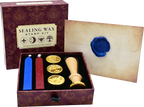 The Sealing Wax Stamp Kit includes a wooden stamp handle, two wax sticks (red and blue), three gold stamp heads, and an envelope sealed with blue wax, all elegantly arranged in an ornate box.