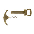 The Solid Polished Brass Anchor Corkscrew & Bottle Opener, featuring curved and angular designs on its handle and sheath, is shown disassembled on a white background—a stylish addition to any bar collection.