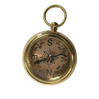 The Solid Polished Brass Pocket Compass features a top loop and displays cardinal directions with degree markings on its face, shown isolated on a white background.