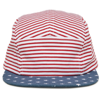 The Stars and Stripes Camper Hat for babies and toddlers features red and white striped panels, a blue brim with white stars, and an adjustable snapback.
