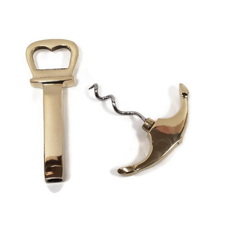 The Solid Polished Brass Anchor Corkscrew & Bottle Opener features a gold finish and disassembles into a heart-shaped handle and spiral screw with curved detail.