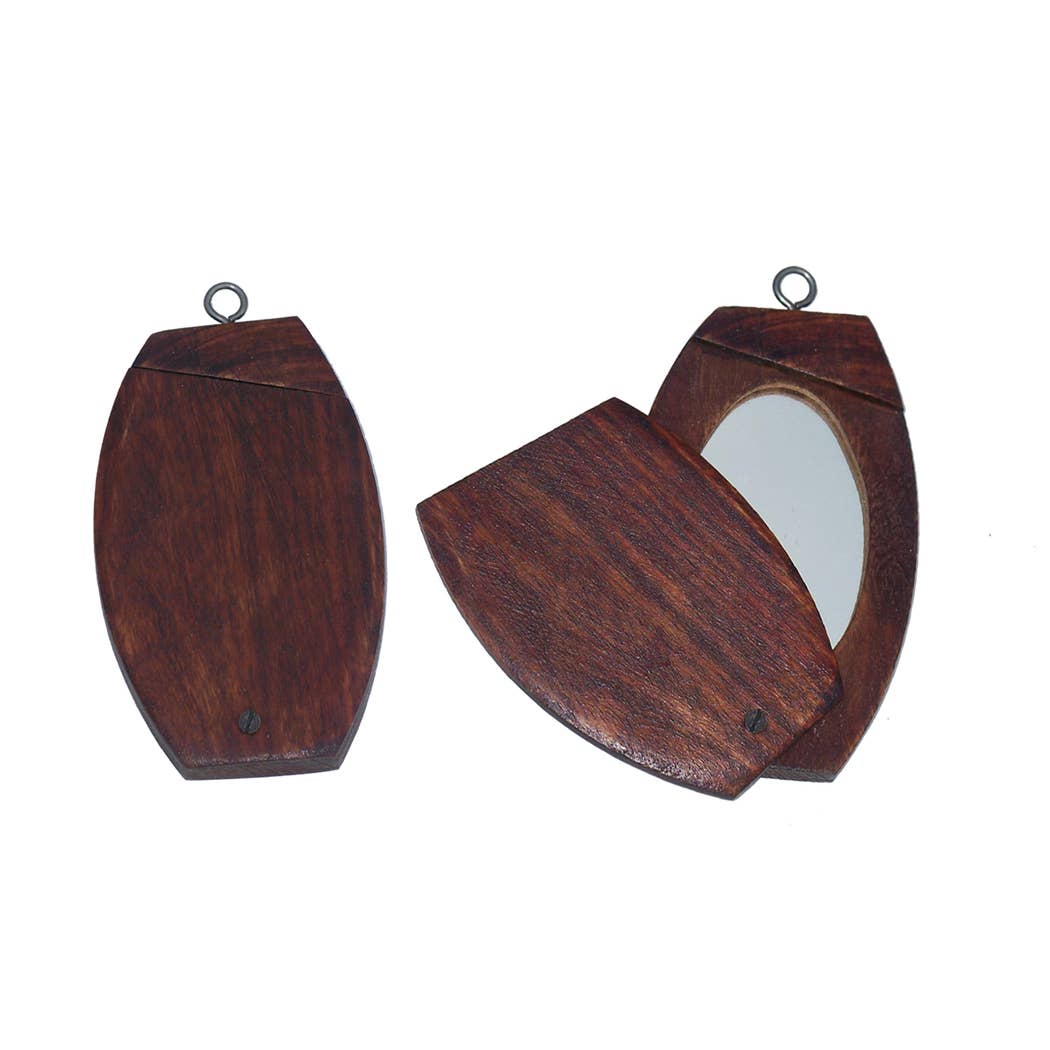Two small Wooden Swivel Traveling Mirrors, one open to show the portable handheld mirror inside and one closed. Each oval mango wood case includes a metal loop on top for attaching to a keychain or necklace.