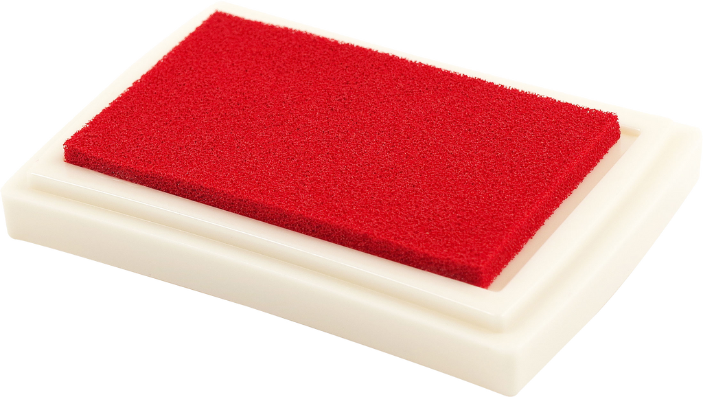 The Studio Series Ink Pad Set features a rectangular red dye ink pad with a white plastic base, ideal for rubber stamping and scrapbooking.
